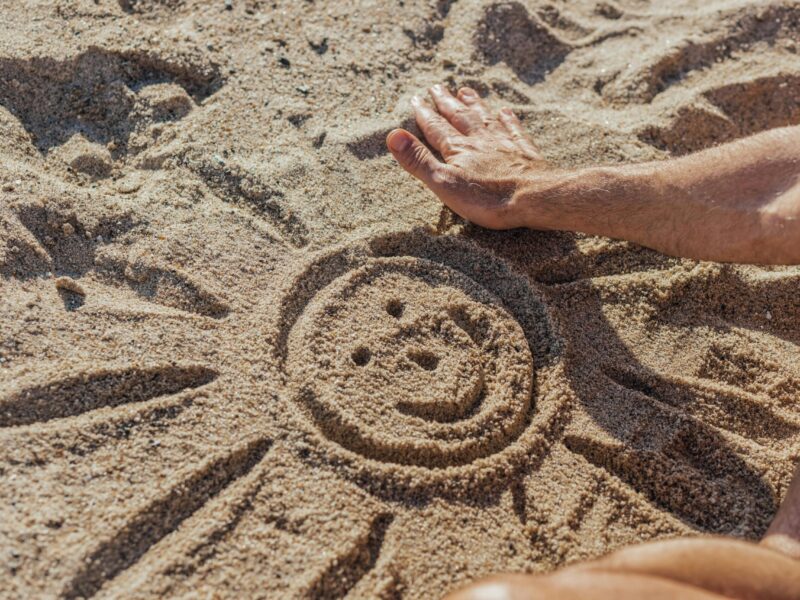 sun smile in sand
